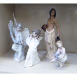 Lladro and Nao porcelain figures: to include a girl holding kittens  8"h