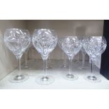 A set of six Waterford cut crystal stemmed wines; and a set of six smaller of the same design