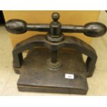 A late Victorian cast iron book press  12"h