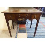 A George III oak side table with three drawers, raised on square, tapered legs  27"h  31"w