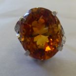 A (probably platinum) ring, set with a Palmieri citrine