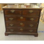 A modern two drawer mahogany filing cabinet, fashioned in the style of a late 18thC dressing chest
