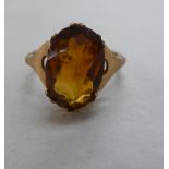 A 9ct gold claw set citrine ring