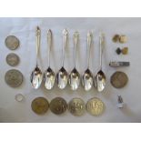 A mixed lot: to include a set of six white metal teaspoons; and a tie clip