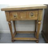 A modern fruitwood and marquetry side table with a single drawer, raised on turned, tapered legs