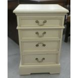 A modern cream painted four drawer bedside chest, on a bracket plinth  26"h  16"w
