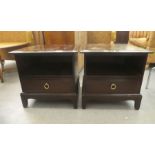 A pair of Stag mahogany bedside tables, each with an open shelf and a drawer, raised on square,