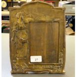 An Art Nouveau pressed brass photograph frame, on an oak easel back  10" x 7"