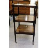 A mid Victorian rosewood three tier whatnot, on turned supports and cup casters  30"h  15"sq