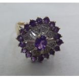 A 9ct gold amethyst and diamond ring