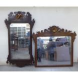 A 19thC Chippendale inspired mirror, set in a part gilded, carved and fretworked mahogany frame,