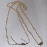 Two similar vintage graduated pearl necklaces