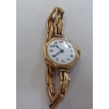 A lady's 9ct gold, octagonal bracelet wristwatch, faced by an Arabic dial