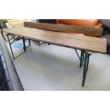 A circa 1960/70s stained pine and metal framed folding table  29.5"h  86"L; and a matching bench