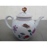 An 18thC Worcester porcelain bullet design teapot, painted with flora and insects
