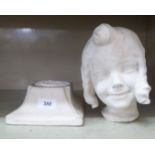 After Max Blomdat - a plaster bust of a young girl, on a plinth  11"h