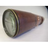 An Aitchison & Co 'The Target' stitched brown hide covered, four draw brass telescope with an