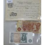 A 1945 £5 banknote, serial No.K09 014951; a £1; and a 10 shilling note
