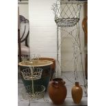 A late Victorian wire framed planter  35"h  36"w; another  17"h; and various terracotta pots