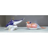 Two Royal Crown Derby china paperweights, viz. a dolphin; and a pheasant  3"h