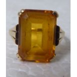 A 9ct gold ring, set with a citrine coloured stone