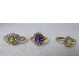 Three 9ct gold rings, set with coloured stones