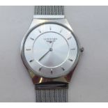 A Longines stainless steel quartz bracelet watch, faced by a baton dial