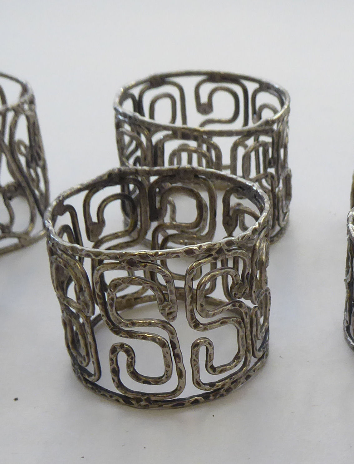 White metalware: to include a set of eight scrolled wire napkin rings - Image 4 of 4