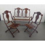 A set of three folding painted cast iron terrace pot stands, fashioned as two miniature standard
