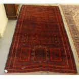 A Turkoman design rug, decorated with geometric shapes and patterns  46" x 86"