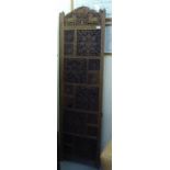 A modern Indian carved and panelled hardwood, four fold room screen  74"h  80"w open