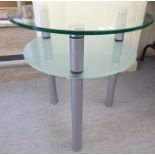A modern clear and frosted plate glass top, two tier side table, raised on three silvered steel legs