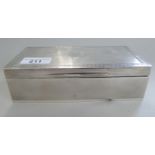 A silver cigarette box, decorated with Greek Key ornament  Sheffield 1919  2"h  7"w