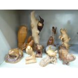 Twelve modern carved wooden models, animals and birds  largest 13"h