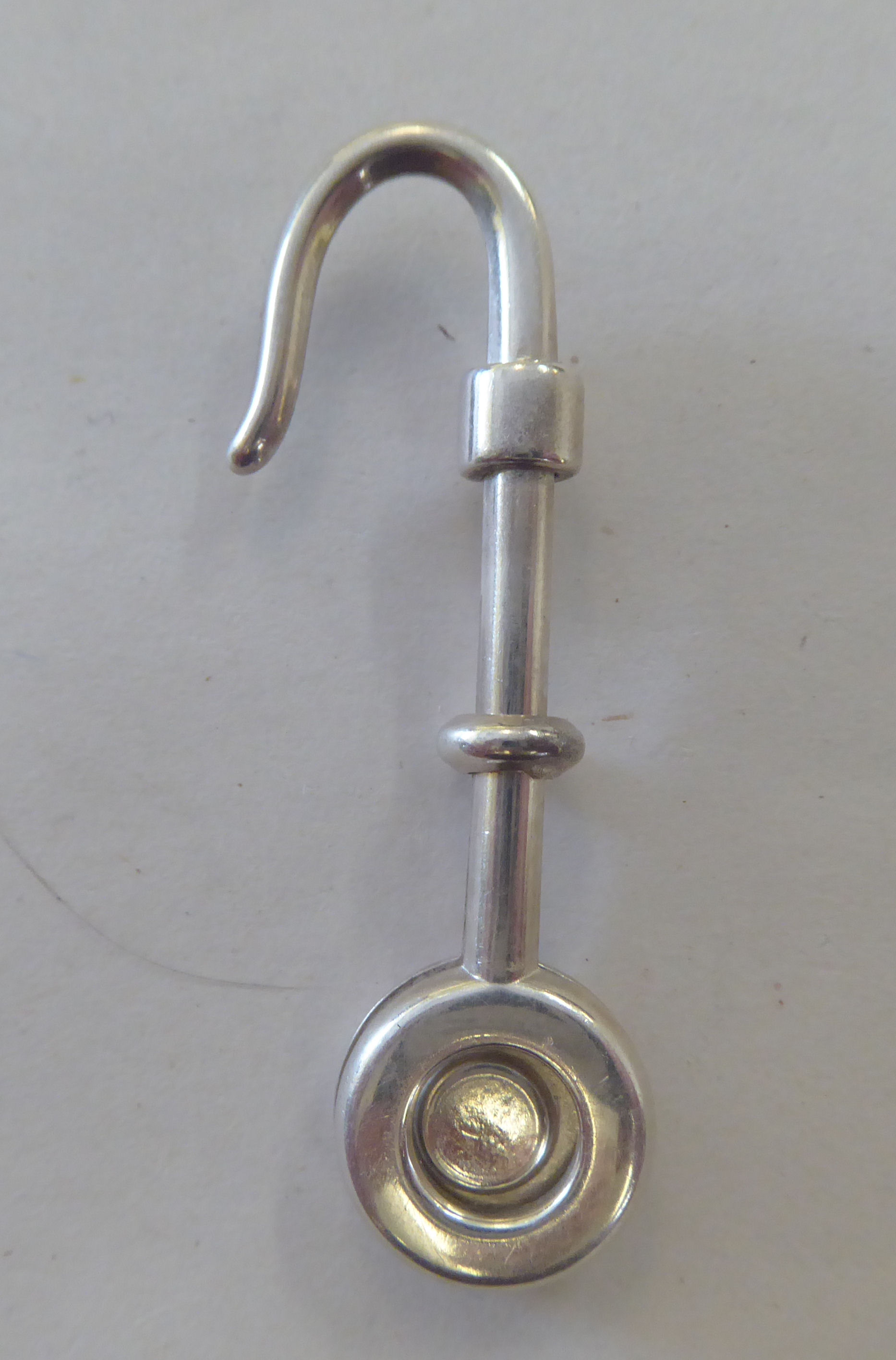 A silver napkin holder