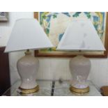 A pair of Ralph Lauren cream coloured and gilded ceramic vase design table lamps with shades  36"h