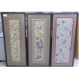 A pair and one similar, Oriental silk tapestry pictures, featuring birds and insects  largest 20"