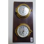A pair of modern brass cased bulkhead instruments, manufactured by Sewells of Liverpool, an