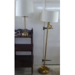 A Ralph Lauren satin finished, lacquered brass finished adjustable standard reading lamp with a