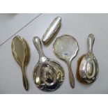 Silver backed dressing table accessories: to include a hand mirror  Birmingham 1907