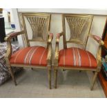A pair of modern French 19thC style gold and cream wash painted open arm bedroom chairs with a