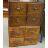 A pair of 1930s oak file/index card boxes, each with four drawers  11"h  15"w