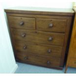 A late 19thC mahogany finished five drawer dressing chest, on a plinth  42"h  39"w