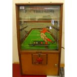 A mid 20thC Mastermatic, Master Football Game, in a light oak end mahogany case  26"h  15"w