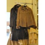 A three quarter length fur coat; two fur box jackets; and a faux fur trimmed, hide jacket  approx.