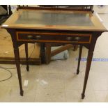 An Edwardian Arts & Crafts design satinwood inlaid mahogany desk with a single drawer, raised on