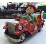 A 1960s Japanese battery powered tinplate model fire engine