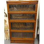 A mid 20thC mahogany Globe Wernicke lead glazed four section bookcase, on a plinth  58"h  34"w