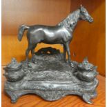 After Mene; Victorian style cast and blackened iron inkstand, surmounted by a standing horse