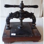 A late Victorian cast iron book press